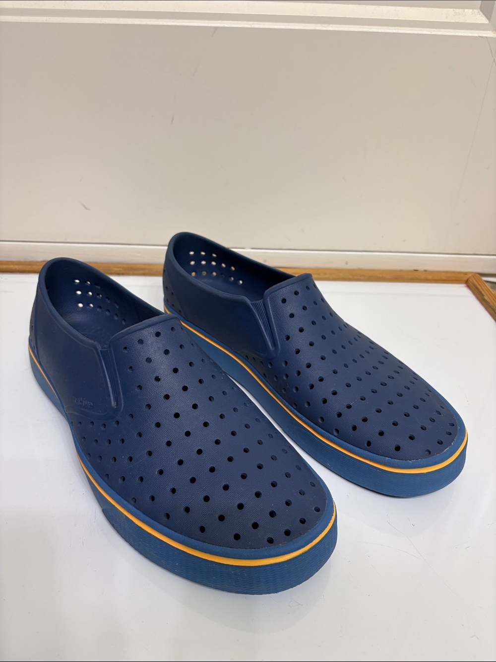 Native Men's Perforated Slip-On Shoes in Navy with Yellow Trim